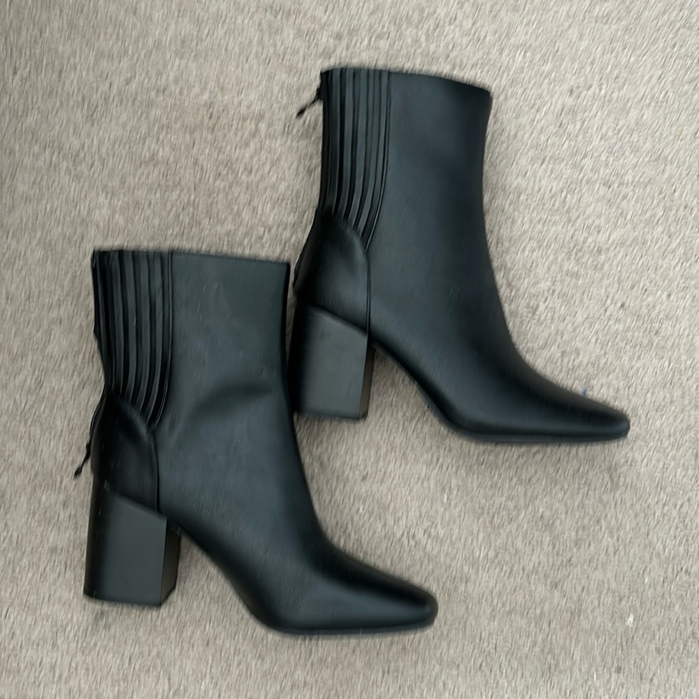 Black heeled boots, never worn!
